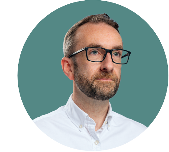 Headshot of the Director, John Robertson.